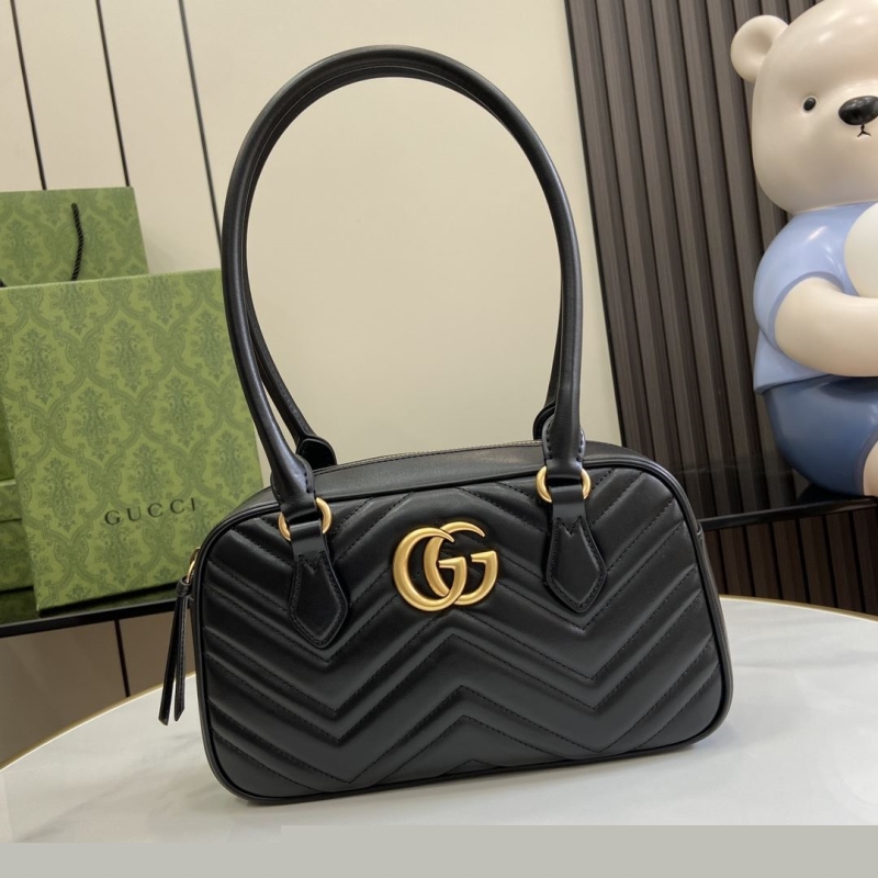 G*u*i top handle bags